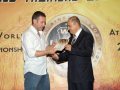 awarding mr. ioannis theofanous coach of the national kickboxing team of greece. a big thanks for his support in organizing the 1st world trainers competition